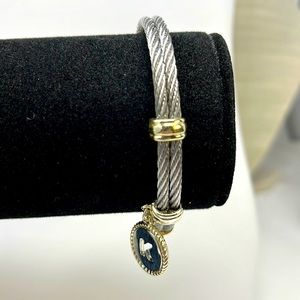 Twisted wire bracelet. Silver and gold tones with “K” charm.  Magnetic clasp